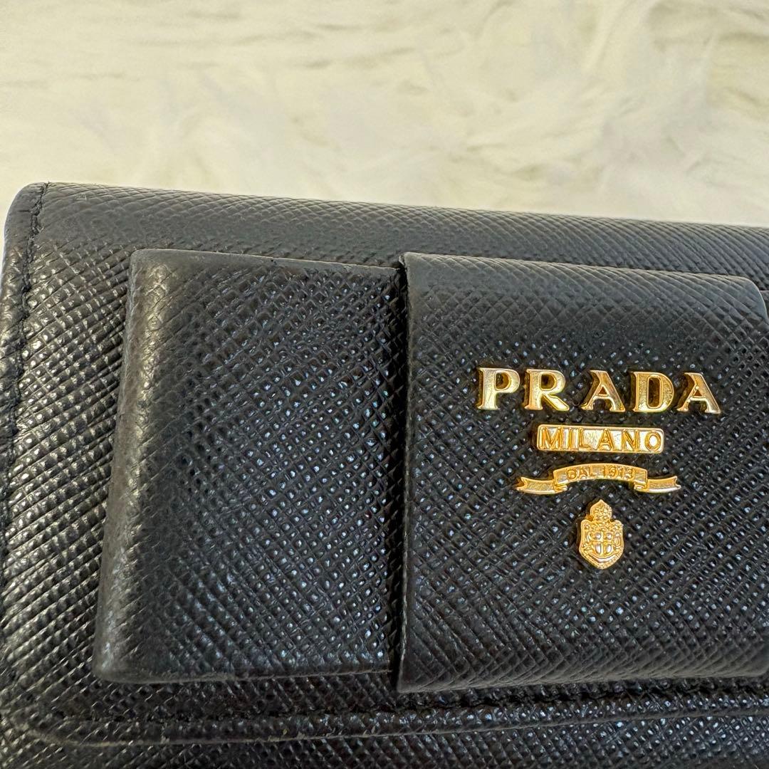 PRADA 良品✨プラダ サフィアーノレザー リボン 6連キーケース 黒 箱付き