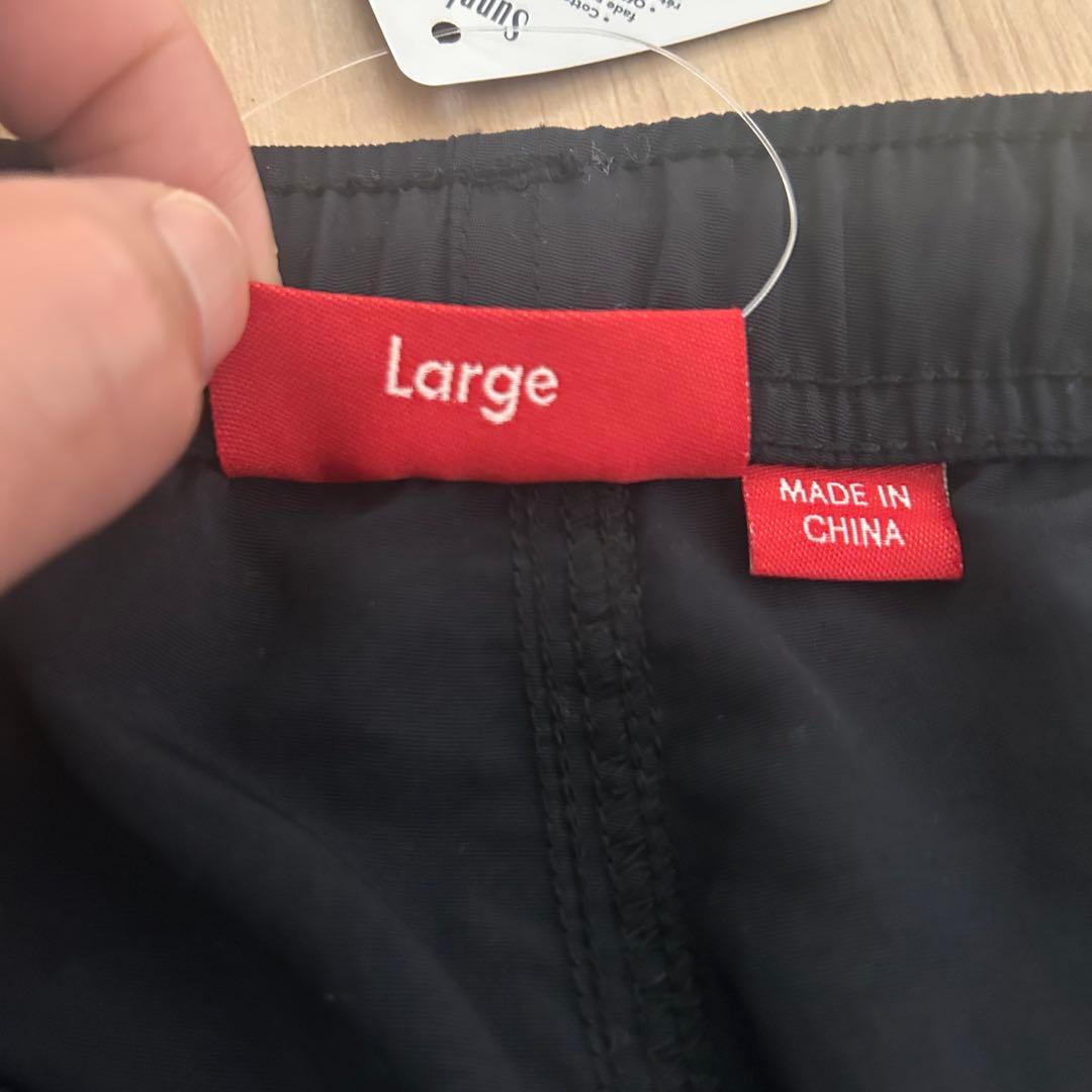 パンツ supreme warm up pant