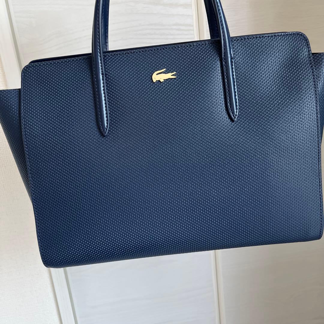 値下げしました！LACOSTE ネイビー バッグ 収納袋付き
