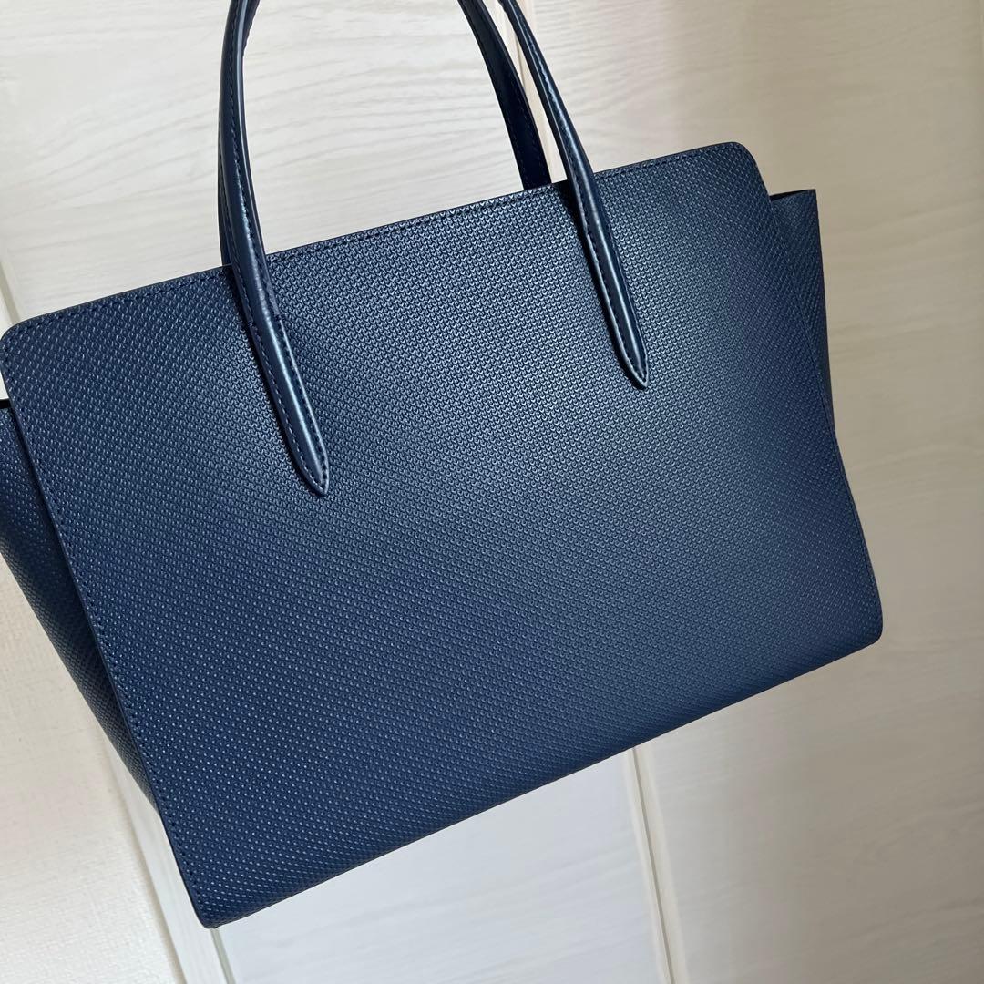 値下げしました！LACOSTE ネイビー バッグ 収納袋付き