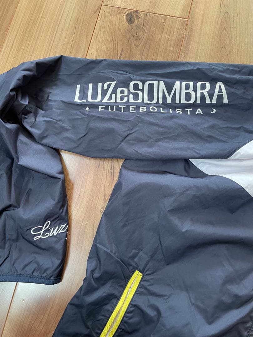 LUZeSOMBRAピステ・ウィンドブレーカー 上下セットMサイズ