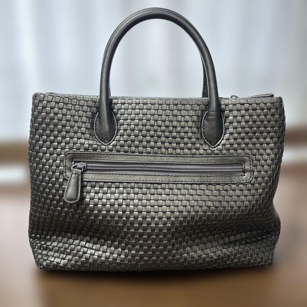 ESTINE レザー編みハンドバッグタッセル付き　ブロンズシルバー　お着物にも