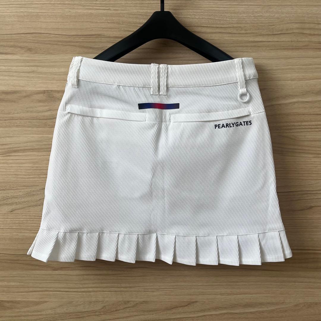 新品★28,600円 パーリーゲイツ 裾プリーツスカート 春夏ホワイトスカート0