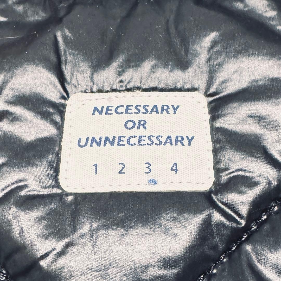 〈NECESSARY OR UNNECESSARY〉中綿ベスト ブラック 日本製