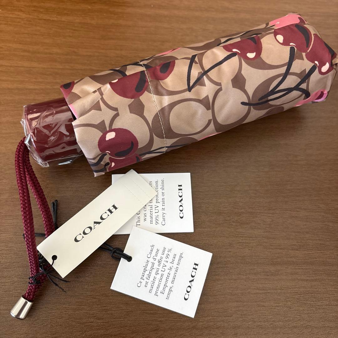 コーチ COACH 折りたたみ傘 シグネチャー チェリー柄