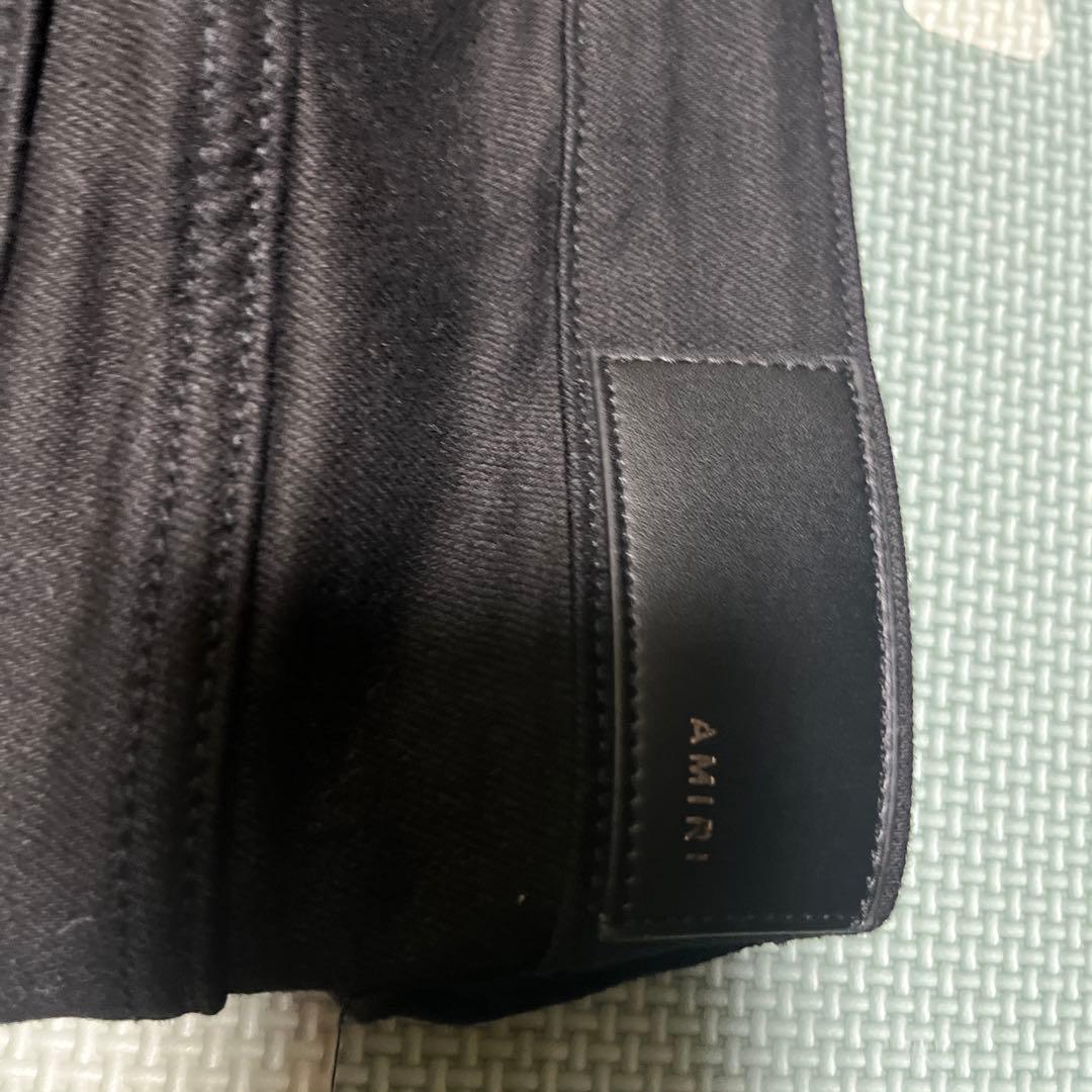 AMIRI ブラック ダメージデニムパンツ